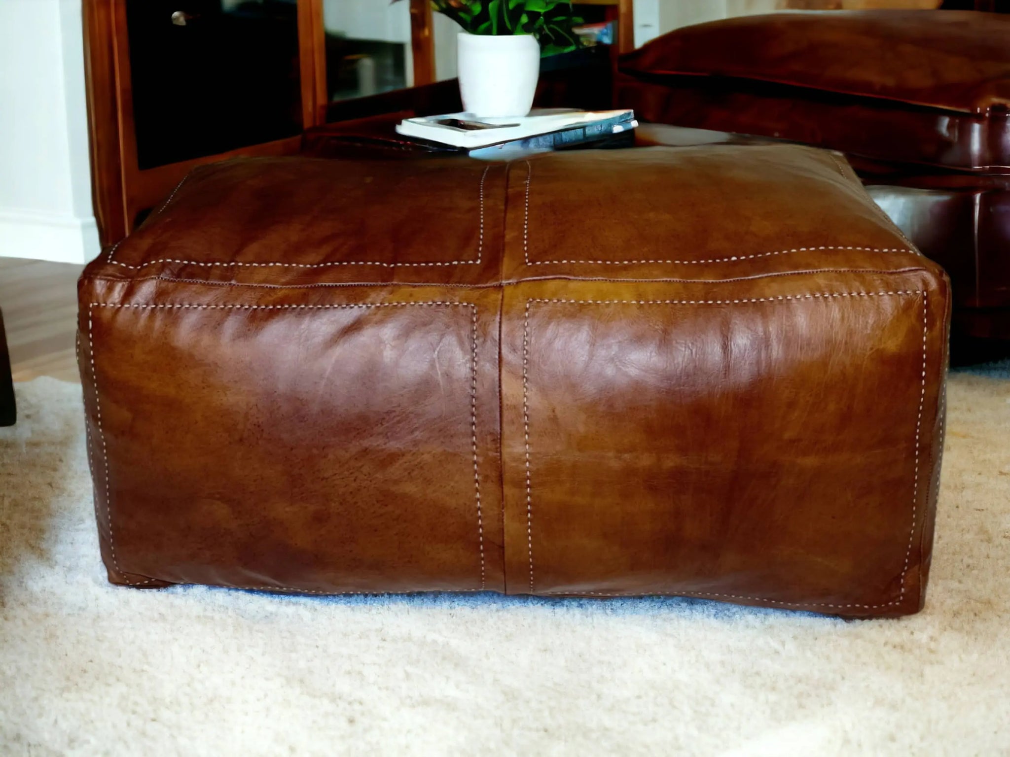 Moroccan Tobacco Leather Handcrafted Pouf: Distinct Elegance for Your Space Soukdecor