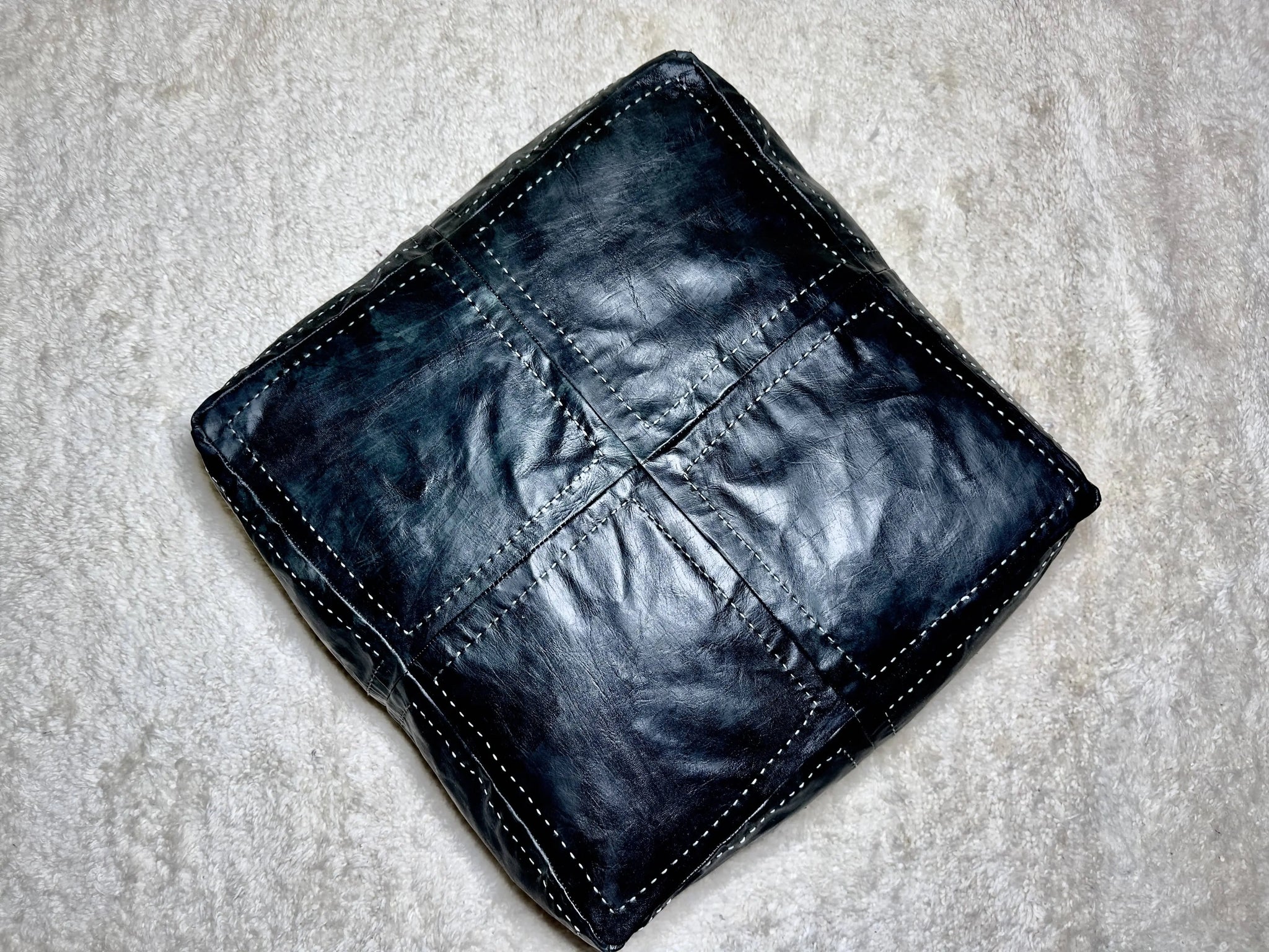 Embrace Timeless Elegance with Our Exquisite Large Black Square Leather Pouf Soukdecor
