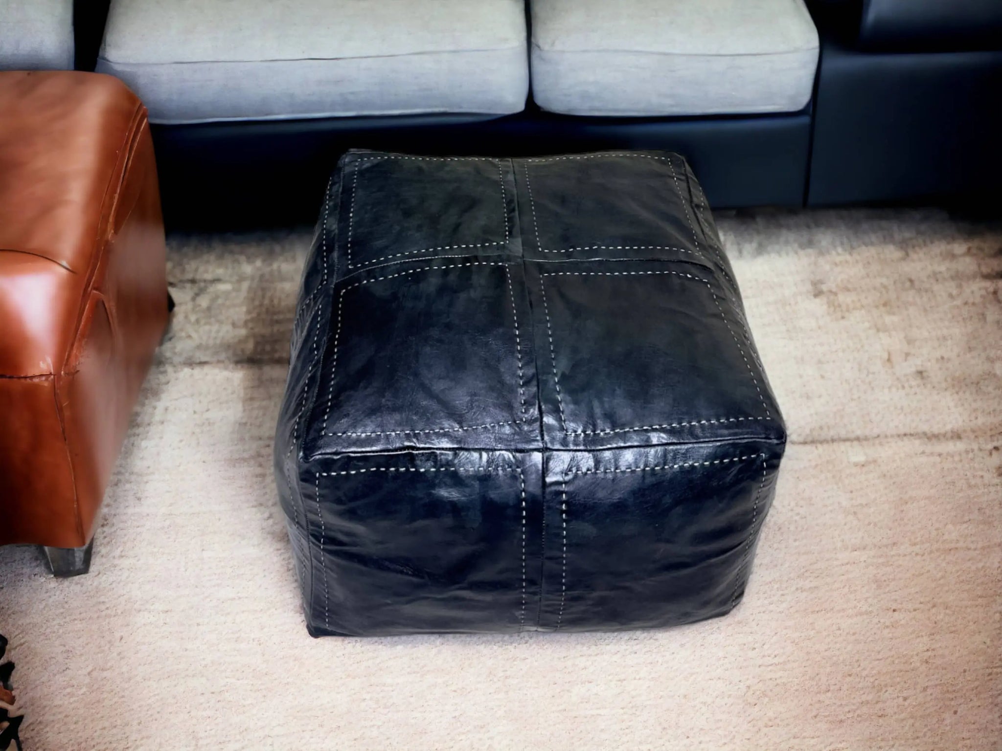Embrace Timeless Elegance with Our Exquisite Large Black Square Leather Pouf Soukdecor
